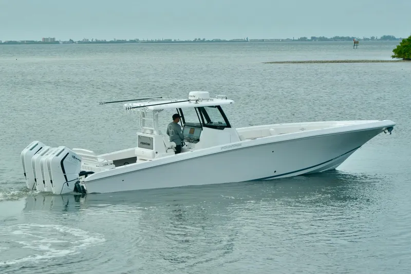 Slide: The Image of 2024 Fountain Bluewater 38 Tournament Edition boat on calm waters. - 5