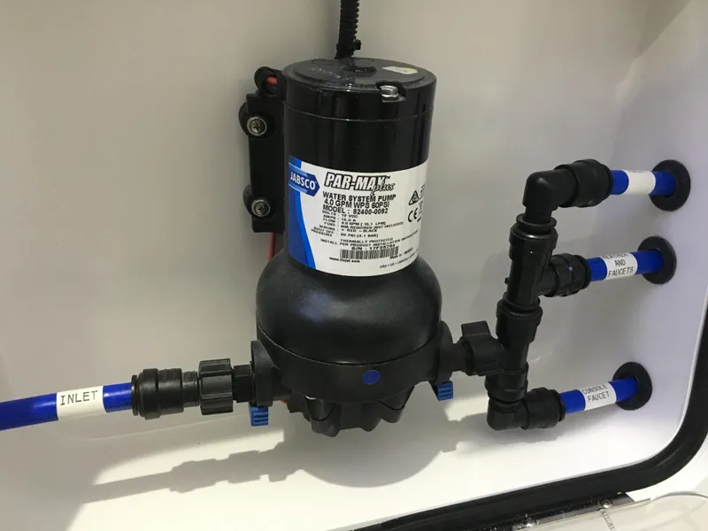 Slide: The Image of Water pump system in 2025 Mag Bay 33 CC boat. - 34