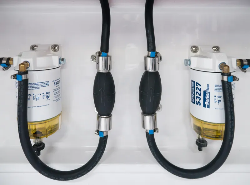 Slide: The Image of Fuel filters and hoses on a 2025 Mag Bay 33 CC boat. - 35