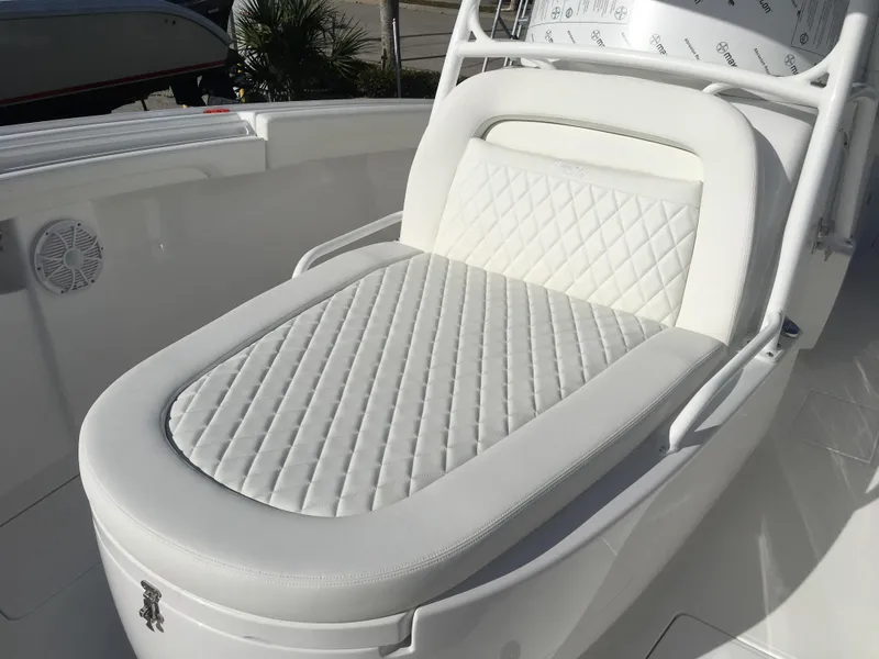 Slide: The Image of 2025 Mag Bay 33 CC boat with luxurious white cushioned seating - 37