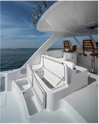 Slide: The Image of 2025 Mag Bay 42 yacht with open deck and seating area. - 12