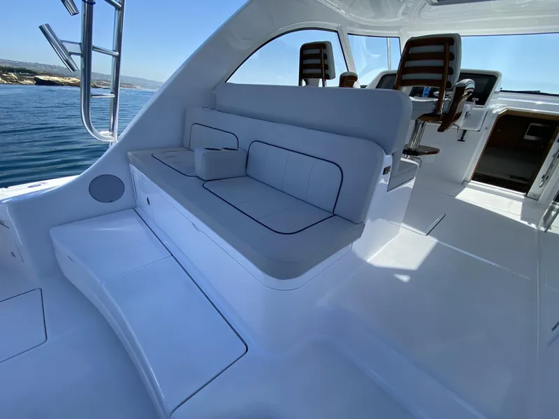 Slide: The Image of Interior seating area of 2025 Mag Bay 42 boat with ocean view. - 17