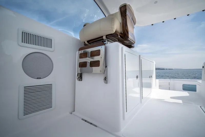 Slide: The Image of Mag Bay 42 (2025) boat interior with seating and storage compartments. - 21
