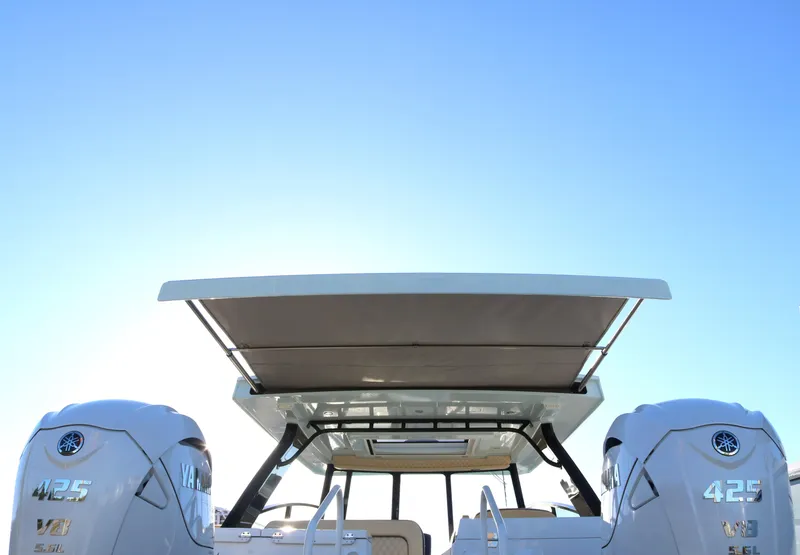 Slide: The Image of 2023 World Cat 400DC-X boat with dual 425 engines and sunshade. - 3