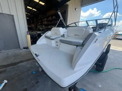 Slide: The Image of 2017 Scarab 195 boat in a storage facility, rear view. - 4