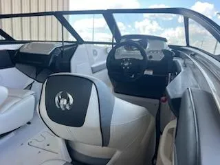 Slide: The Image of 2017 Scarab 195 boat interior with steering wheel and seating. - 6