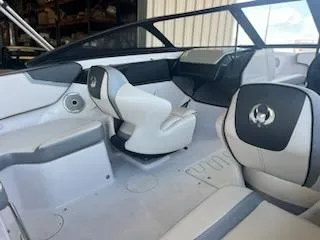 Slide: The Image of 2017 Scarab 195 boat interior with white and gray seating. - 7