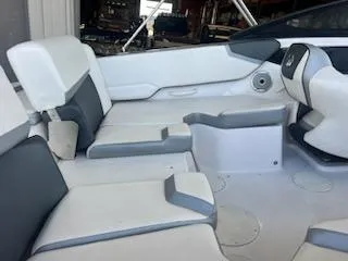 Slide: The Image of 2017 Scarab 195 boat interior with white and gray seating. - 8