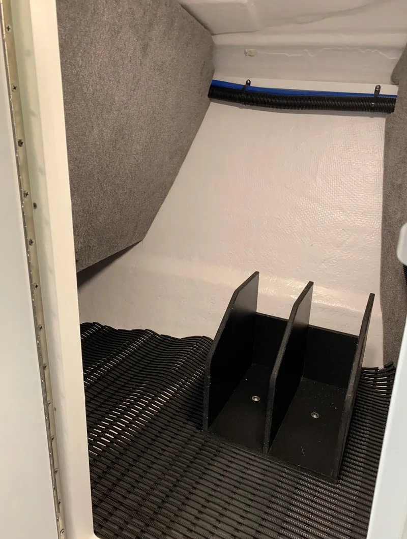 Slide: The Image of 2023 Monterey 298 Super Sport storage compartment interior. - 19