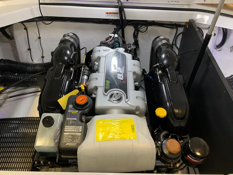 Slide: The Image of 2023 Monterey 298 Super Sport engine compartment with dual engines. - 25