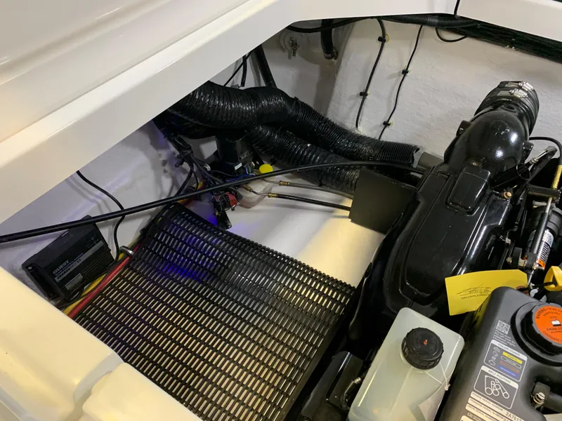 Slide: The Image of Engine compartment of a 2023 Monterey 298 Super Sport boat. - 26