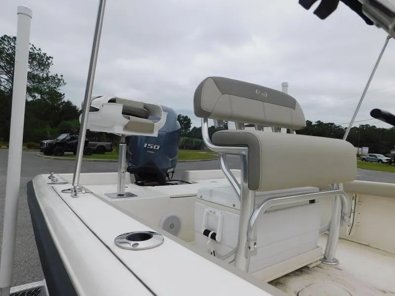 Slide: The Image of 2023 Key West 188 BR boat with seating and outboard motor. - 11