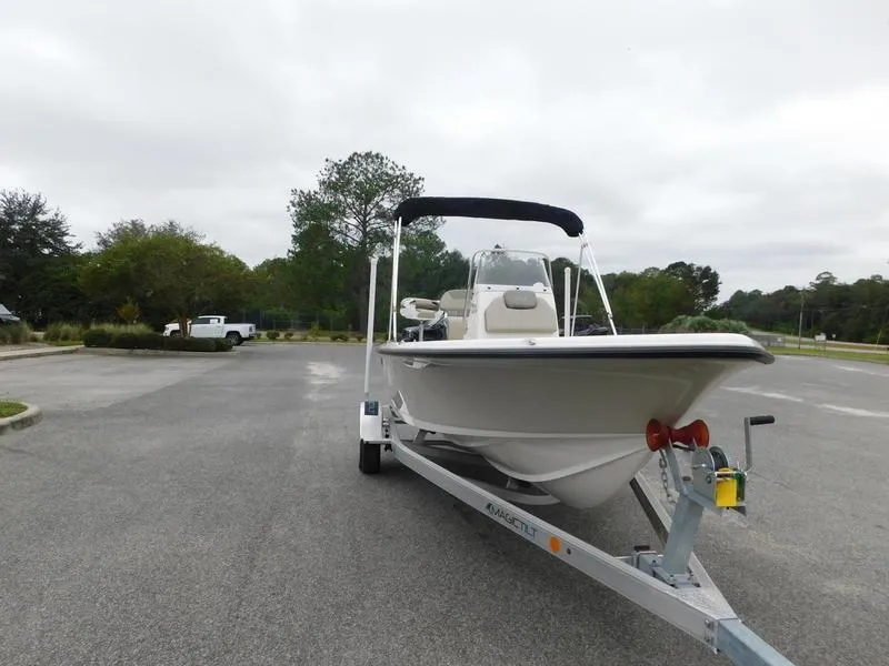 Slide: The Image of 2023 Key West 188 BR boat on trailer in parking lot. - 3
