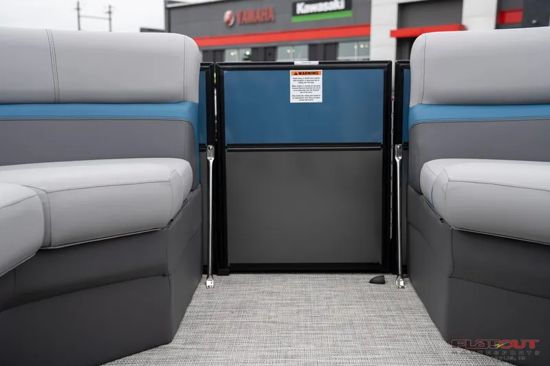 Slide: The Image of 2023 South Bay RearSeating 200hp boat interior with gray and blue seating. - 19