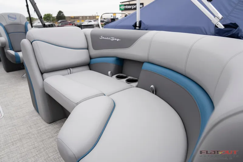 Slide: The Image of 2023 South Bay RearSeating 200hp boat with luxurious gray and blue upholstery. - 20