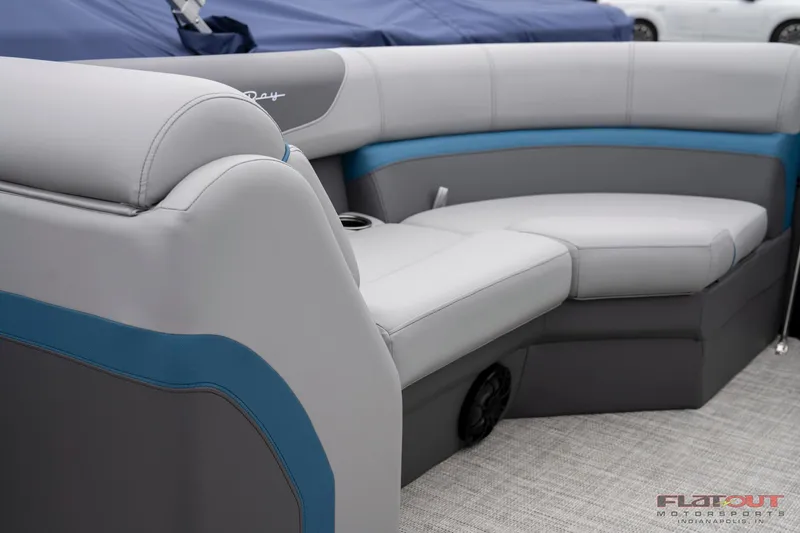 Slide: The Image of 2023 South Bay RearSeating 200hp boat with luxurious gray and blue upholstery. - 21