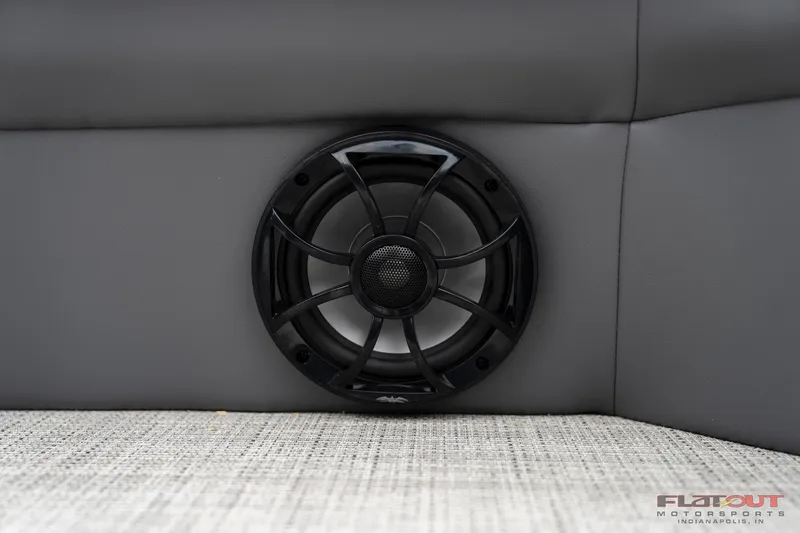 Slide: The Image of 2023 South Bay RearSeating 200hp boat speaker on gray upholstery. - 22