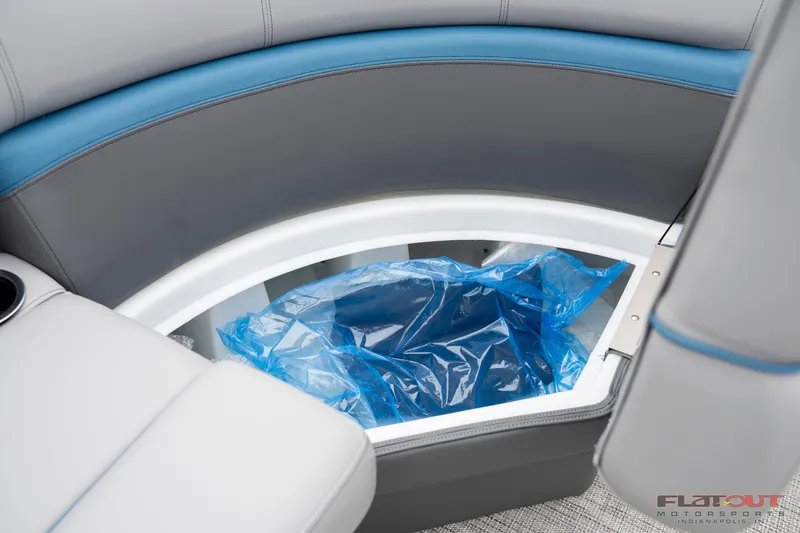 Slide: The Image of 2023 South Bay RearSeating 200hp boat with under-seat storage compartment. - 24