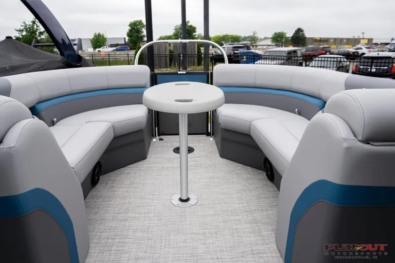 Slide: The Image of 2023 South Bay RearSeating 200hp pontoon boat with spacious seating and central table. - 28