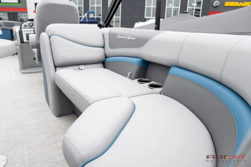 Slide: The Image of 2023 South Bay RearSeating 200hp boat with luxurious gray and blue upholstery. - 3
