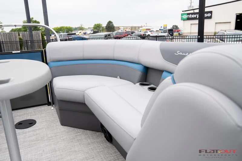 Slide: The Image of 2023 South Bay RearSeating 200hp pontoon boat with luxurious gray and blue seating. - 5