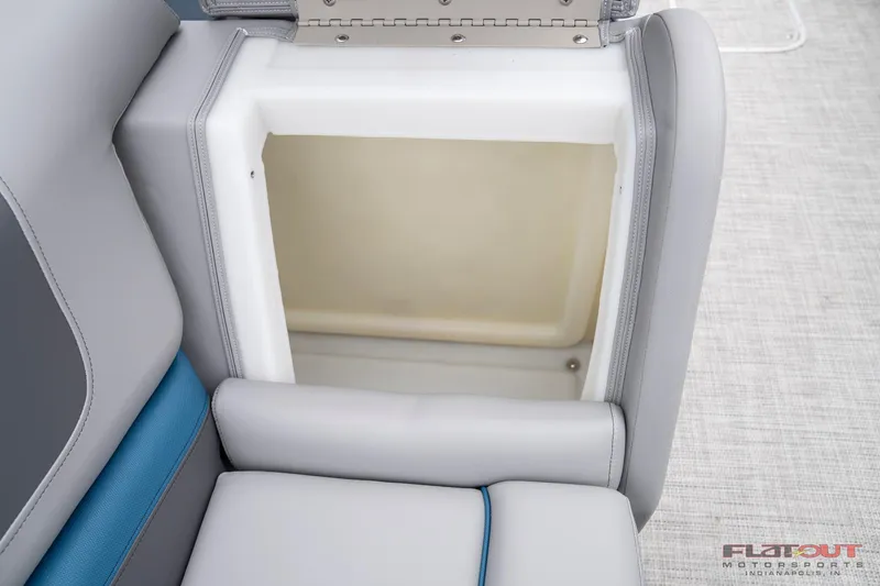 Slide: The Image of 2023 South Bay RearSeating 200hp boat with open storage compartment. - 9