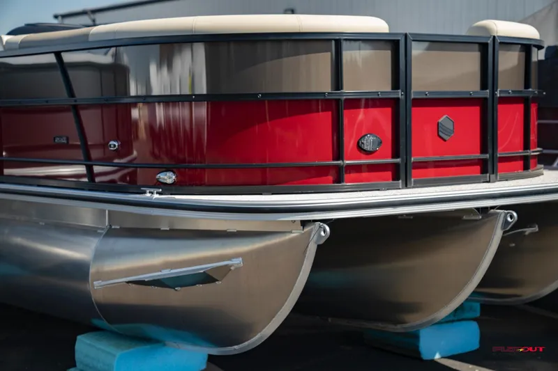 Slide: The Image of 2023 South Bay RearSeating 200hp pontoon boat with red and silver exterior. - 1