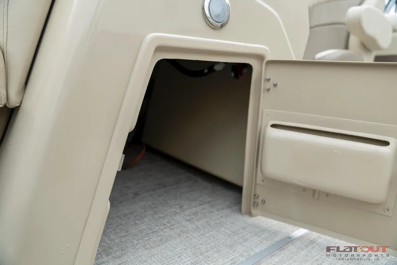 Slide: The Image of 2023 South Bay RearSeating 200hp storage compartment with beige interior. - 20