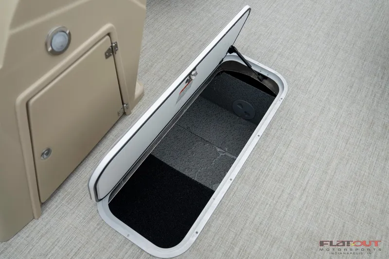 Slide: The Image of 2023 South Bay RearSeating 200hp storage compartment with open hatch. - 21
