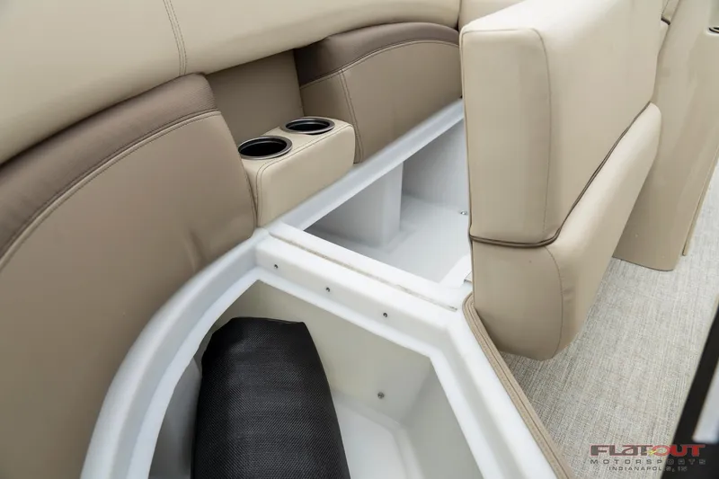 Slide: The Image of 2023 South Bay RearSeating 200hp boat with under-seat storage and cup holders. - 25