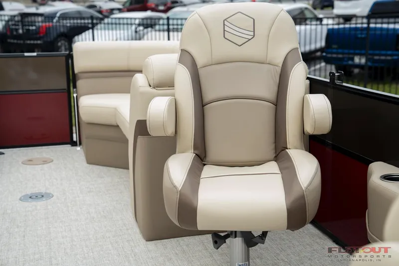 Slide: The Image of 2023 South Bay RearSeating 200hp boat with luxurious beige and brown seats. - 8