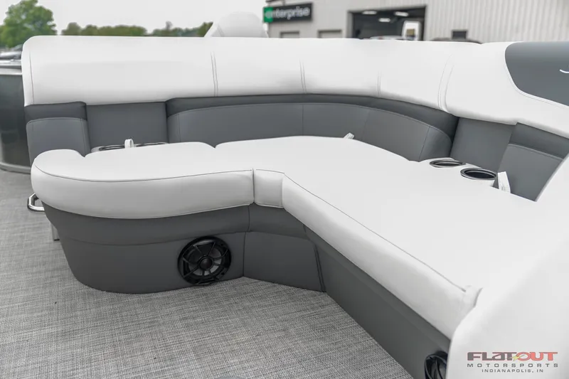Slide: The Image of 2023 South Bay S224 Cruise & Fish 200HP boat interior with cushioned seating. - 10