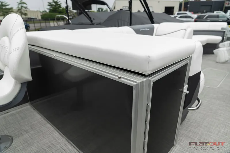 Slide: The Image of 2023 South Bay S224 Cruise & Fish 200HP boat interior seating and storage. - 12