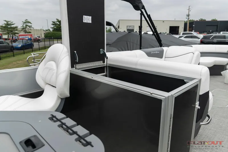 Slide: The Image of 2023 South Bay S224 Cruise & Fish 200HP boat interior with white seating. - 13