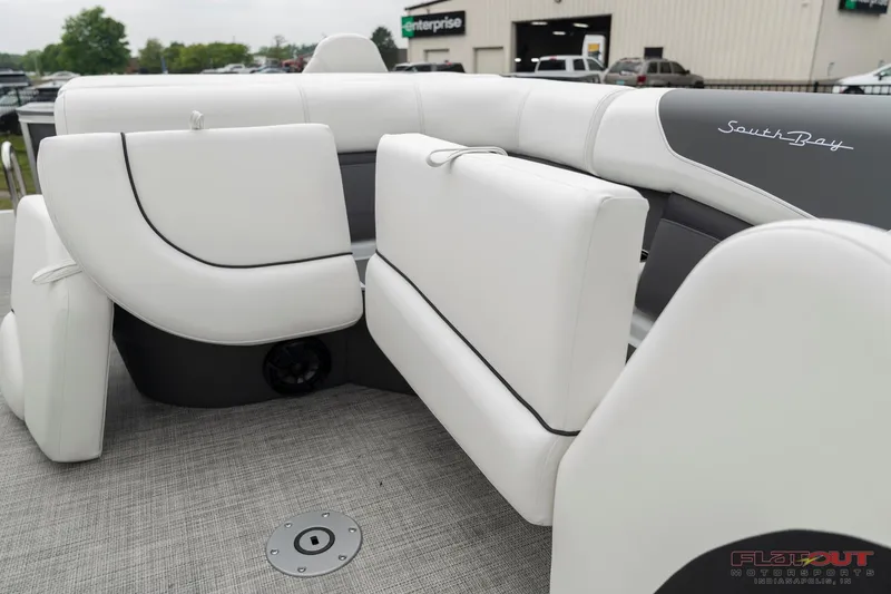 Slide: The Image of 2023 South Bay S224 Cruise & Fish 200HP boat interior with white seating. - 16