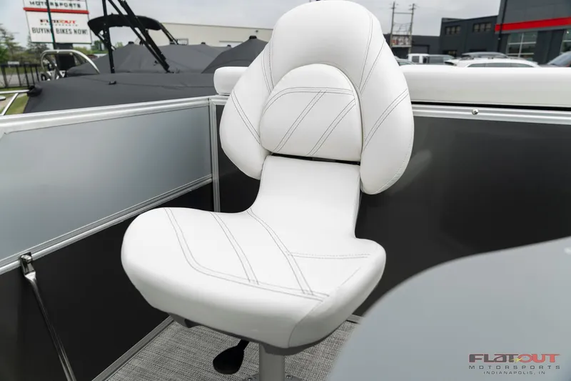 Slide: The Image of 2023 South Bay S224 Cruise & Fish 200HP boat with white cushioned seat. - 25