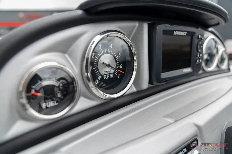 Slide: The Image of Close-up of 2023 South Bay S224 Cruise & Fish 200HP dashboard gauges and display. - 28