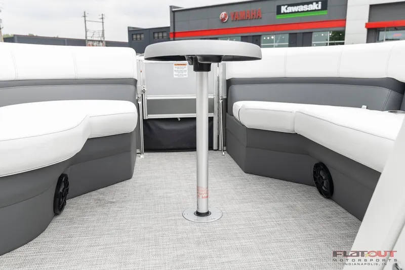 Slide: The Image of 2023 South Bay S224 Cruise & Fish 200HP boat interior with seating and table. - 3