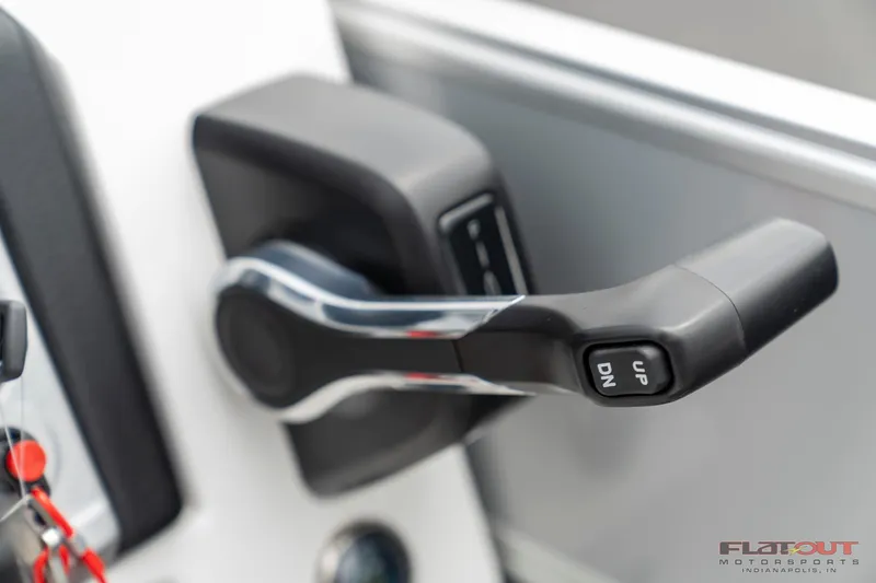 Slide: The Image of Close-up of throttle control on 2023 South Bay S224 Cruise & Fish 200HP boat. - 31