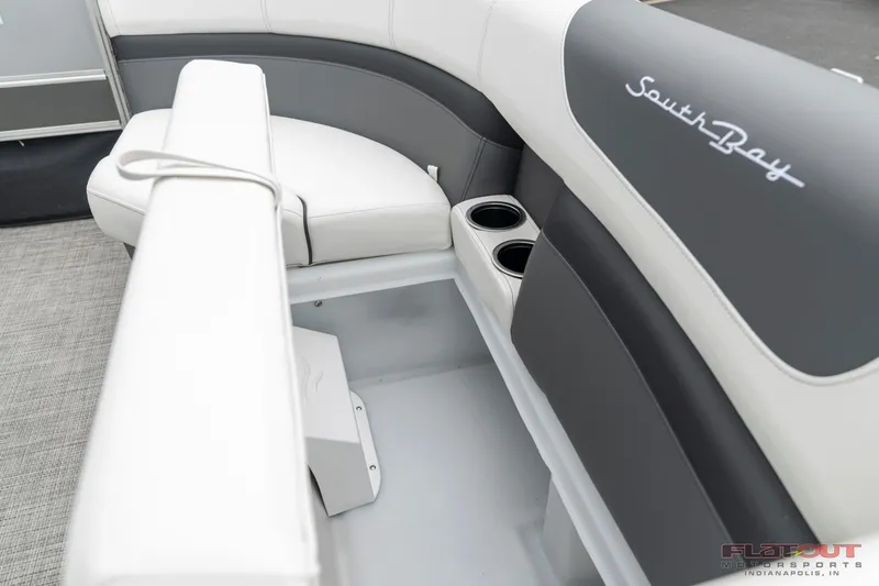Slide: The Image of 2023 South Bay S224 Cruise & Fish 200HP boat interior with cushioned seating and cup holders. - 33