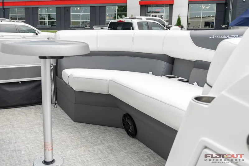 Slide: The Image of 2023 South Bay S224 Cruise & Fish 200HP boat interior with white and gray seating. - 5