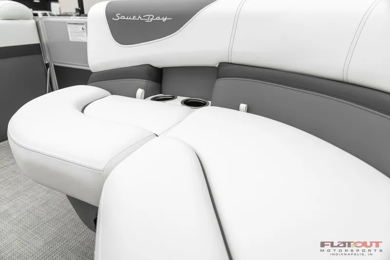 Slide: The Image of 2023 South Bay S224 Cruise & Fish 200HP boat interior with white and gray seating. - 8
