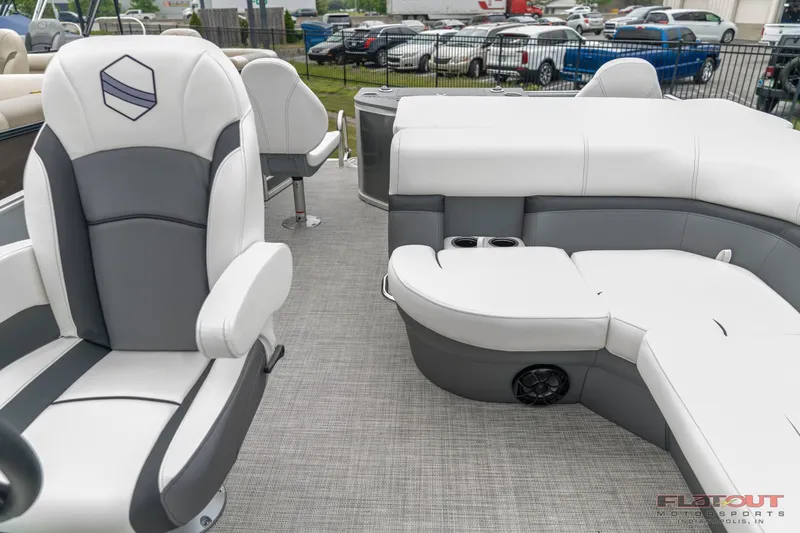 Slide: The Image of 2023 South Bay S224 Cruise & Fish 200HP interior with plush seating and cup holders. - 9