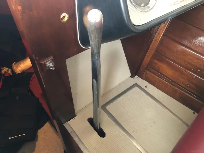 Slide: The Image of 1960 Chris-Craft 24 Sportsman boat interior with gear shift lever. - 14