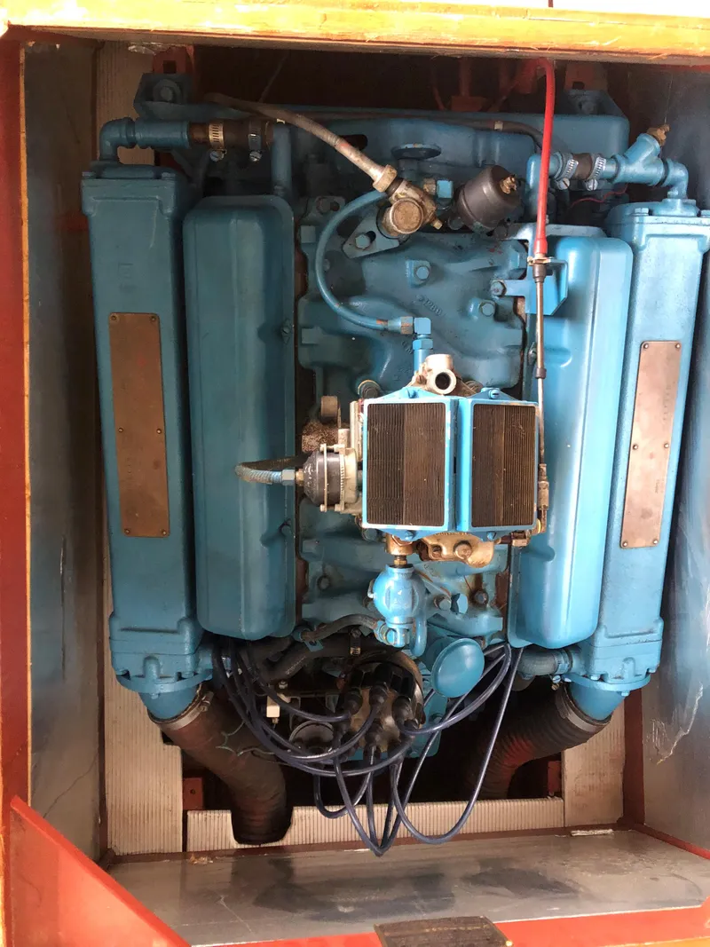 Slide: The Image of 1960 Chris-Craft 24 Sportsman engine in blue, detailed view. - 24