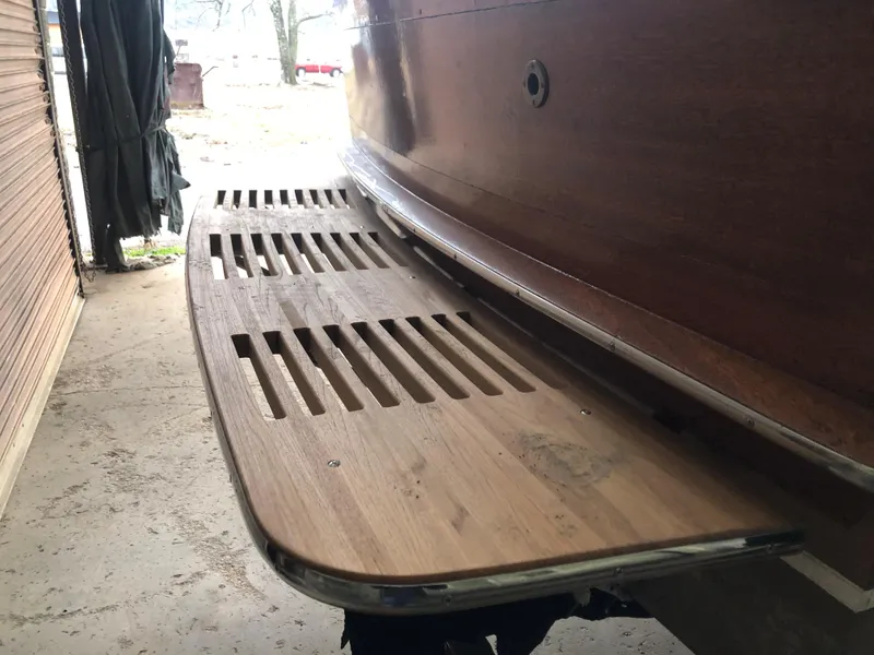 Slide: The Image of 1960 Chris-Craft 24 Sportsman wooden boat stern with slatted swim platform. - 3