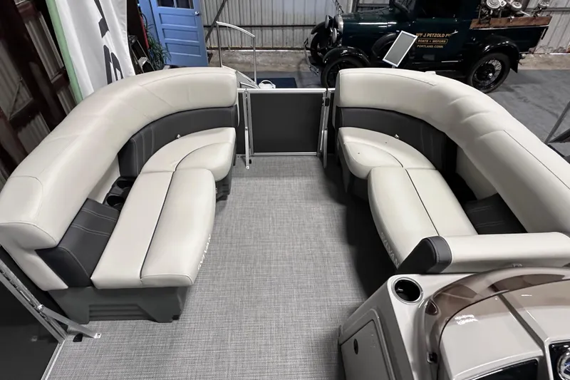 Slide: The Image of 2026 Sylvan Mirage 820 LZ pontoon boat with spacious seating and modern design. - 15