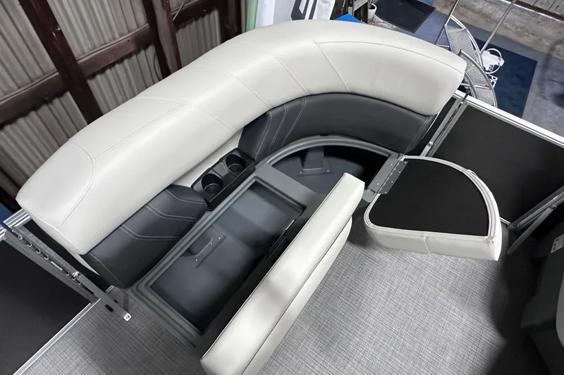 Slide: The Image of Interior seating of 2026 Sylvan Mirage 820 LZ pontoon boat with storage compartments. - 16