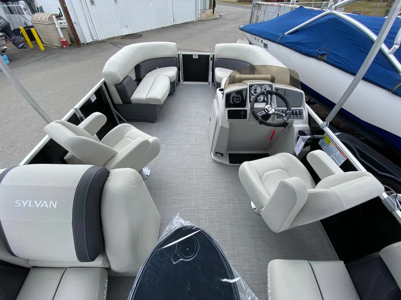 Slide: The Image of Interior of Sylvan Mirage 820 LZ pontoon boat, model year 2026. - 2
