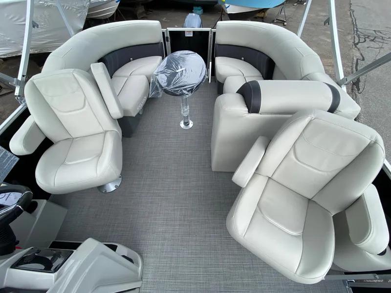 Slide: The Image of Interior of 2026 Sylvan Mirage 820 LZ with luxurious seating. - 3